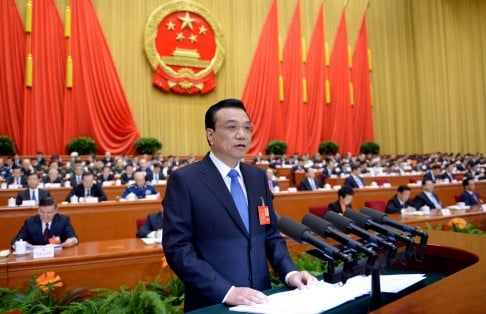 Premier Li Keqiang delivers State Council's annual work report at the Great Hall of the People in Beijing yesterday. Photo: Xinhua