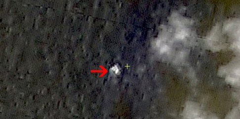 A satellite image taken from space on Mar. 9, shows objects in a "suspected crash sea area" in the South China Sea. Photo: CCRSDA. 