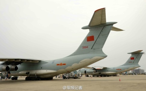 Two Russian-made Ilyushin IL-76 aircraft seen at Sanya Phoenix International Airport before takeoff for Malaysia on Friday morning. Screenshot via Sina Weibo