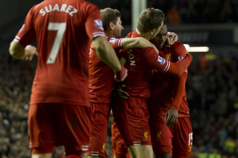 Liverpool's Daniel Sturridge (right) celebrates with teammates after putting his side 2-0 in front. Photo: AP