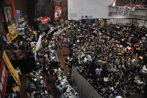 More than 200 protesters - mostly students - occupy the parliament building in Taipei. Photo: AFP