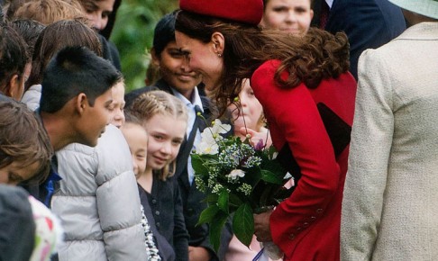 Catherine meets local schoolchildren during a welcoming ceremony at Government House. Photo: AFP