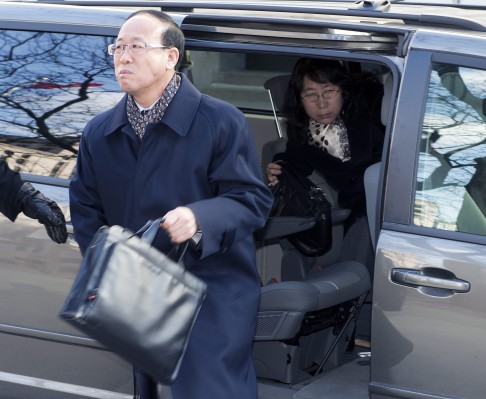 Qian Liu's father Liu Jianhui and mother Zheng Yaru, right, arrive at court. Photo: AP