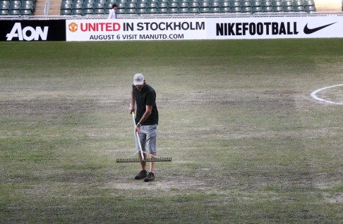 The Hong Kong Stadium pitch was in a sorry state hours before a match between Kitchee and Manchester United last July. Photo: May Tse