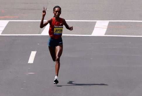Rita Jeptoo of Kenya approaches the finish line to win the women's section of the Boston Marathon. Photo: AFP