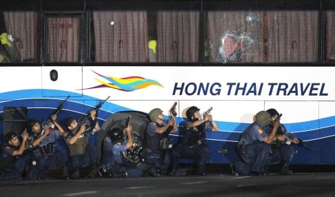 Philippine police at the ready after Hongkongers were taken hostage on their tour bus in Manila in August 2010. Photo: Reuters