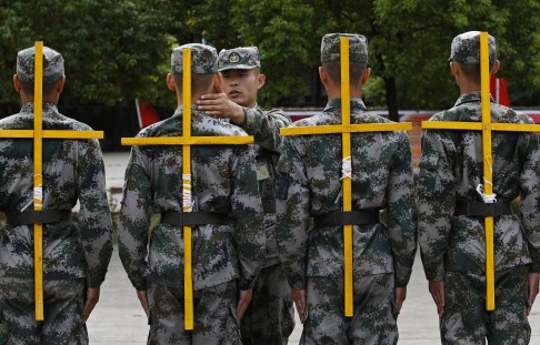 Recruits take part in posture training in Hangzhou. Photo: Reuters