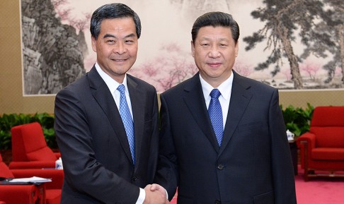 Chief Executive CY Leung with President Xi Jinping in Beijing. Photo: Xinhua 