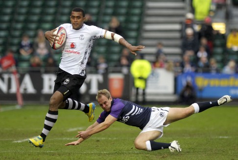 Fiji's Samisoni Viriviri evades a tackle from Scotland's Andrew Turnbull during the third-place play-off, won 17-10 by the Pacific islanders. 