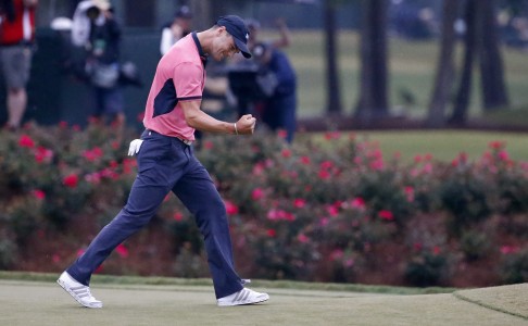 Martin Kaymer celebrates making a crucial 28-foot putt on the 17th hole. Photo: EPA