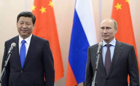 President Xi Jinping (left) will discuss the deal of co-operation with his Russian counterpart, Vladimir Putin, who will visit Shanghai on Tuesday. Photo: EPA