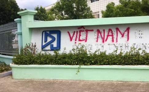 The defaced entrance to a factory in Binh Duong. Photo: Patrick Boehler SCMP