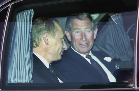 Russian President Vladimir Putin shares a limousine with Prince Charles during his visit to Britain in 2003. Photo: AP 