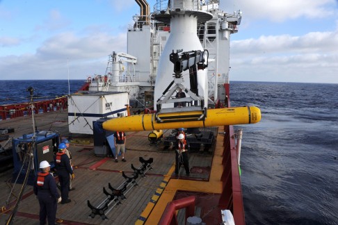 Crew aboard the Australian ship Ocean Shield had been using the US Navy's Bluefin-21 submersible (yellow) to detect signs of the aircraft. Photo: Reuters