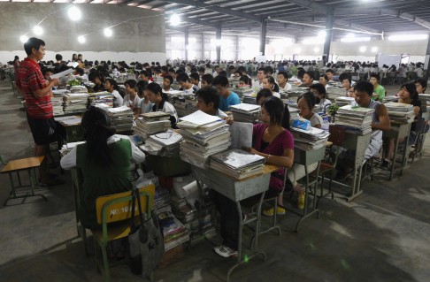 Middle school students attend lessons ahead of the gaokao in 2008. This year, some 9.39 million students will take the university entrance test. Photo: Reuters