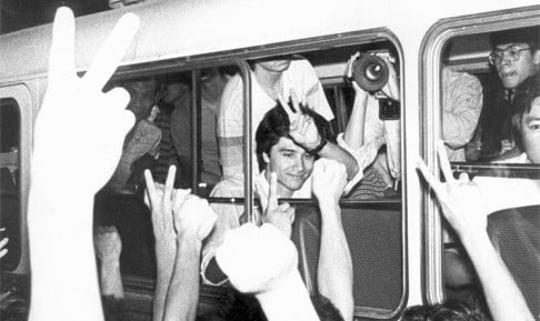 Cheung Chi-tak (centre) and other members of the Hong Kong soccer team receive a heroes' welcome at Kai Tak airport on May 20, 1985. Photo: SCMP Pictures