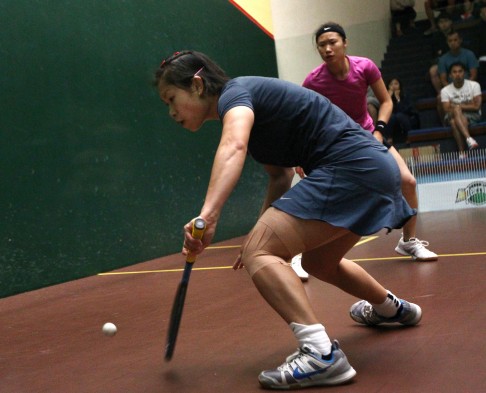 Annie Au (front) battles Joey Chan in the women's final of the Hong Kong Squash Championships. Photo: Jonathan Wong