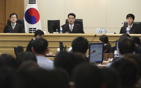 Judges sit to preside over a trial of crew members of the sunken ferry Sewol at Gwangju District Court. Photo: Reuters