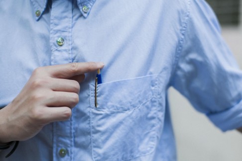 Leung keeps a pen in the pocket of his Engineered Garments shirt.
