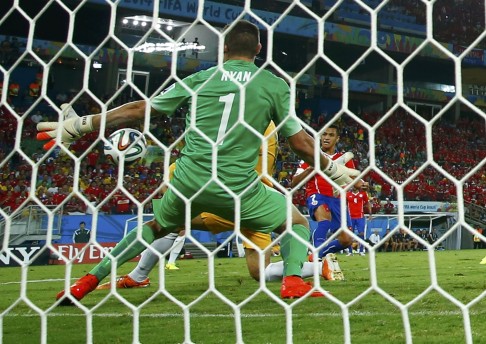 Alexis Sanchez puts Chile 1-0 up. Photo: Reuters