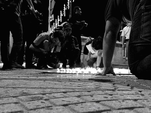 Some concerned Malaysians held a candle light vigil for passengers of the missing Flight MH370 in Kuala Lumpur. Photo: Satish Cheney