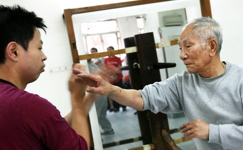 Ip Chun (right), son of wing chun master Ip Man, welcomed the addition of kung fu styles to the heritage list. Photo: Dickson Lee