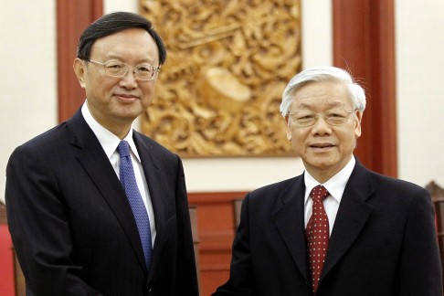 Chinese State Councilor Yang Jiechi (left) meets Vietnamese Communist Party's General Secretary Nguyen Phu Trong in Hanoi. Yang stressed that the first oil rig, platform 981, was in Chinese territory. Photo: Reuters