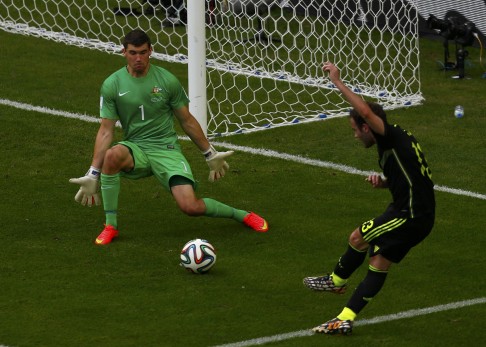 Juan Mata makes it 3-0 for Spain. Photo: Reuters