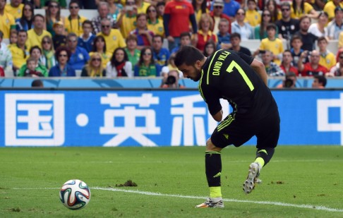 David Villa backheels the ball in to open the scoring. Photo: AFP