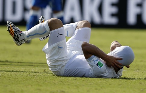 Suarez reacts after Uruguay's victory over Cesare Prandelli's Italy side. Photo: Reuters