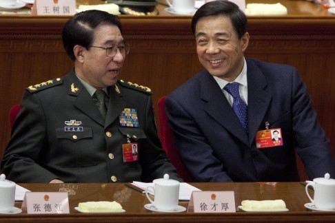 Xu Caihou (left) with convicted former Chongqing party boss Bo Xilai at a 2012 party meeting. Photo: Bloomberg