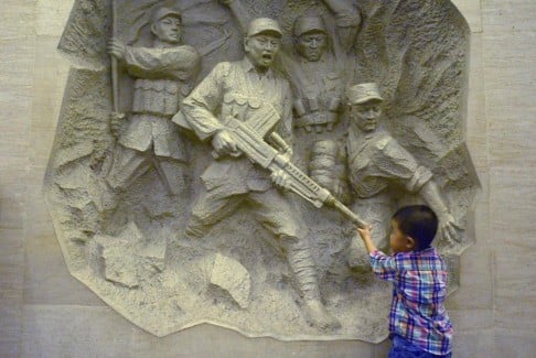 A boy visits a Beijing museum dedicated to the war. Photo: AFP