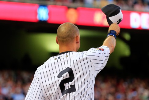Derek Jeter acknowledges the fans, who gave the legendary shortstop a 63-second standing ovation when he came up to bat. Photo: AP