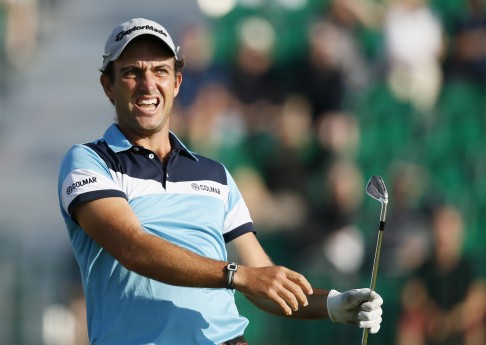 Edoardo Molinari of Italy watches his shot off the 4th tee at the Royal Liverpool golf club, Hoylake. Photo: AP 