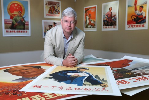 Christopher Bailey with the "troublemaker" posters. Photo: K.Y. Cheng