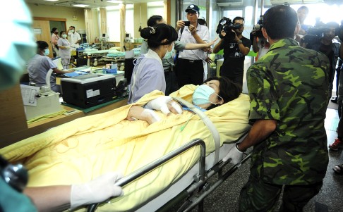 A survivor is transferred to Kaohsiung from Penghu Hospital in Penghu. Photo: AP