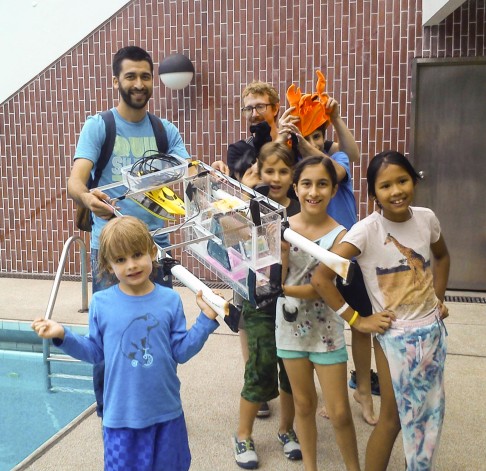 Harada's fleet of robots were tested in a swimming pool with the help of Hong Kong Harbour School students. 