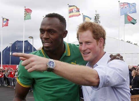 Usain Bolt with Britain's Prince Harry at the Commonwealth Games village in Glasgow. Photo: Reuters