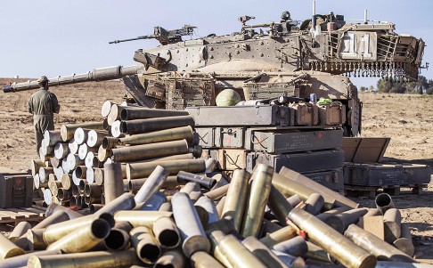 Shell cases stacked at an Israeli army deployment area near the border with Gaza. Photo: AFP