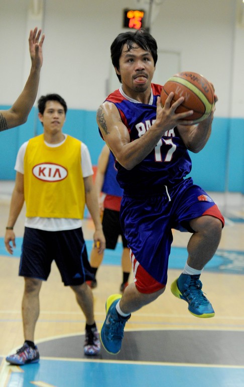 Manny Pacquiao's first love is basketball and he hopes to play in the professional Philippine Association for his team, Kia Motors. Photo: AFP 