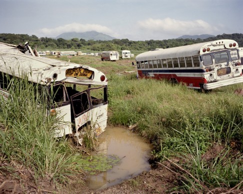 Discarded buses litter a field at the former Howard Air Force Base. The base was closed on November 1, 1999, as a result of the Torrijos-Carter Treaties, which specified that US military facilities in the zone be closed. For more than 50 years, the base had been the bastion of US air power in Central and South America. In its heyday, it was the centre for counternarcotics operations, military and humanitarian airlifts and search and rescue operations. The buses, known locally as the "diablos rojos" (red devils), were used, some until as recently as last year, to ferry children to school.