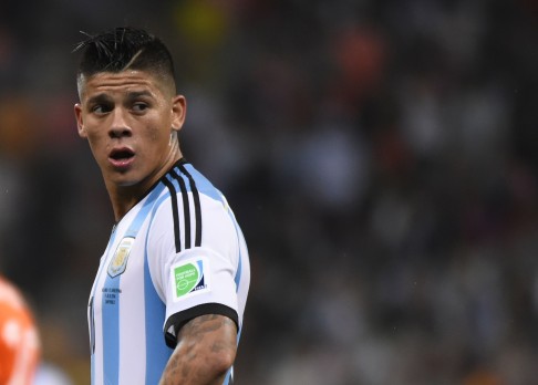 Argentinian defender Marcos Rojo is one of the new signings for United but has yet to receive his work permit. Photo: AFP