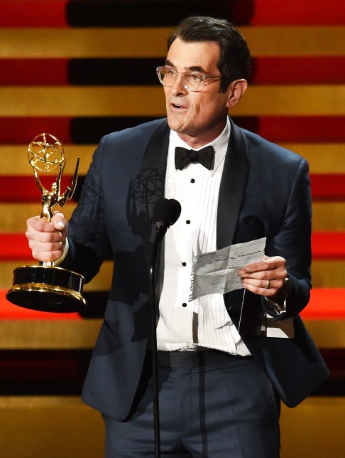 Actor Ty Burrell accepts Outstanding Supporting Actor in a Comedy Series for 'Modern Family'. Photo: AFP