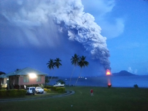 A photo taken today shows Mount Tavurvur spewing rocks and ash into the air. Photo: AFP