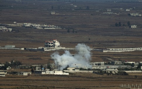 Smoke rises following an explosion on the Syrian side near the Quneitra border crossing, where fighters from the al-Qaeda affiliate al-Nusra Front have clashed with Israeli troops. Photo: Reuters