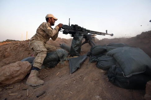 A peshmerga fighter at Sulaiman Bek. Photo: Reuters