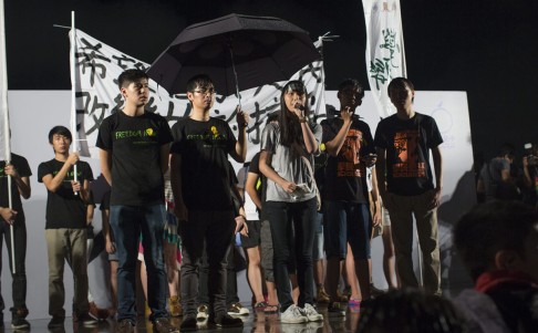 Protesters attend a rally organized by the Occupy Central with Love and Peace movement outside the Chief Executive office. Photo: EPA