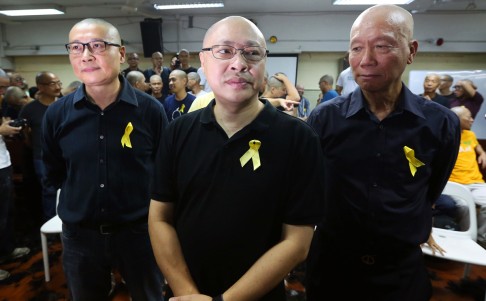 "Occupy Central with Love and Peace" (OCLP) movement organizers (left to right) Chan Kin-man, Benny Tai Yiu-ting and Chu Yiu-ming have their head shaved in public at St. Bonaventure Church in Tsz Wan Shan on September 9. Photo: Sam Tsang