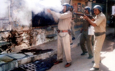 Police fire teargas at rioters in Ahmedabad in April 2002 in the western Indian state of Gujarat, where Narendra Modi was chief minister. Photo: AFP 