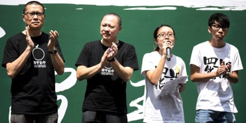 Pro-democracy activist and Occupy Central co-founders (from left) Chan Kin-man, Benny Tai attend a rally with student protesters near the government headquarters in Hong Kong on September 28, 2014. Photo: AFP